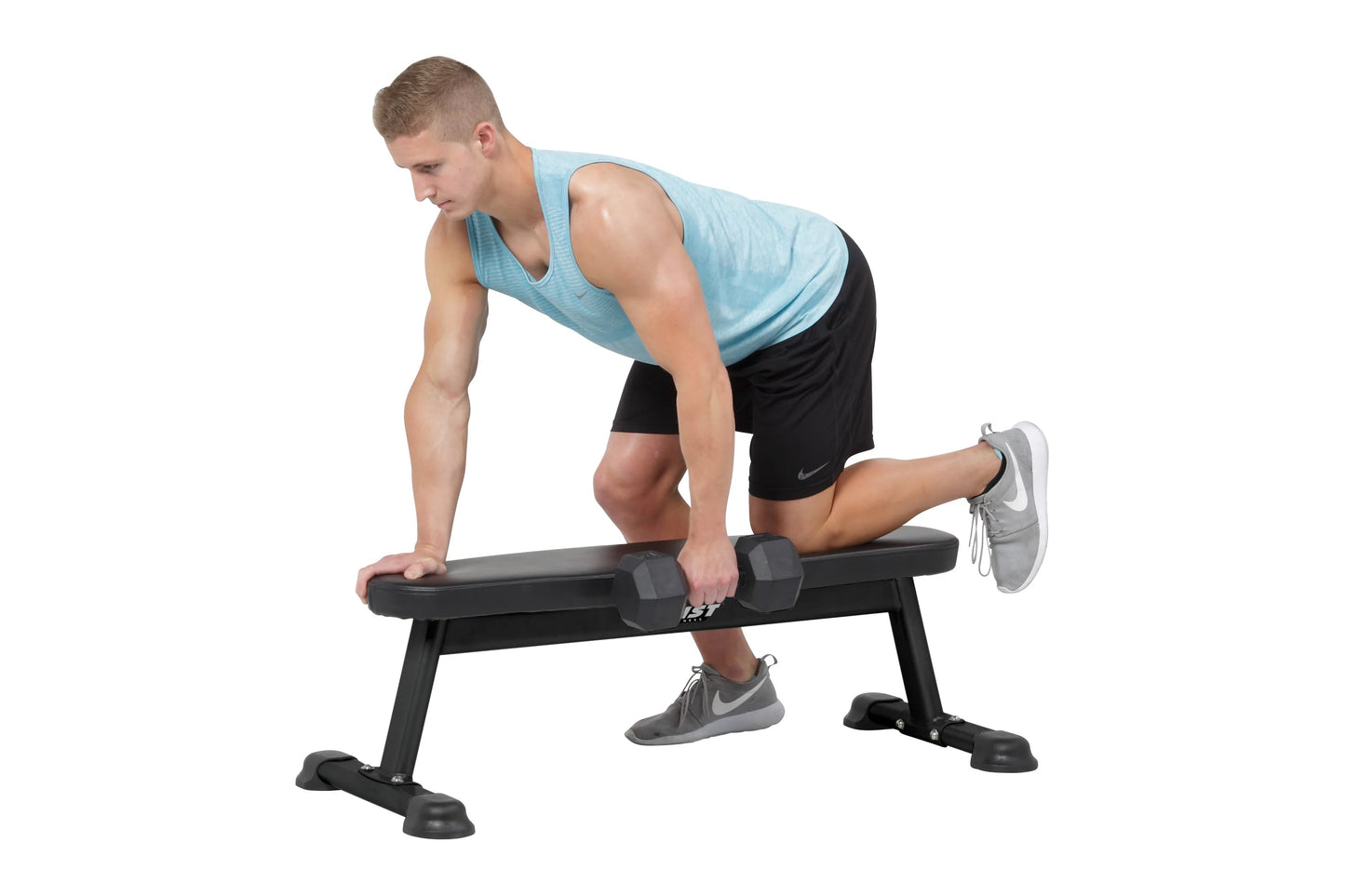 Man performing dumbbell exercise on black flat utility weight bench with padded seat and sturdy frame