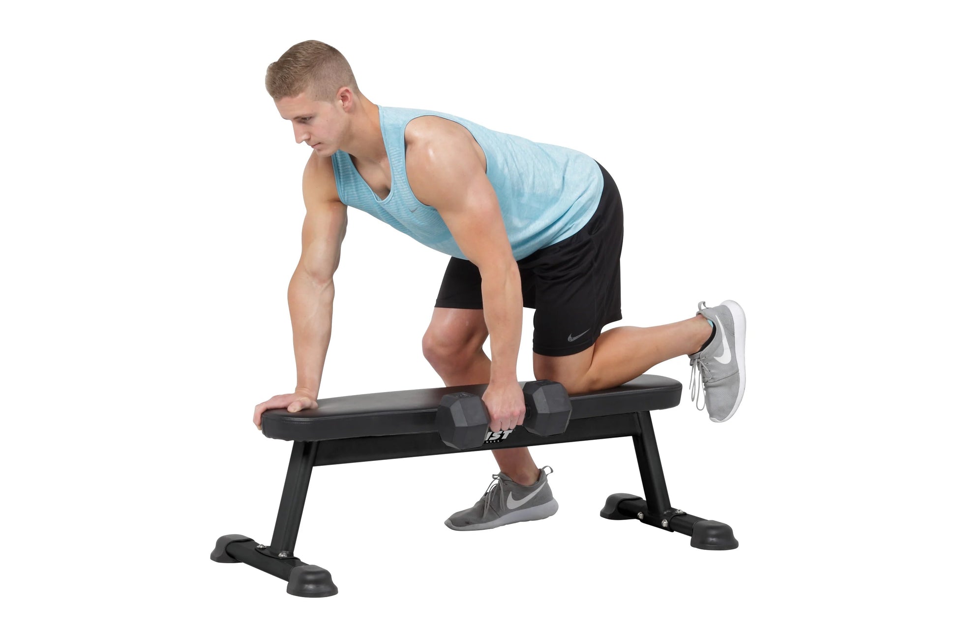 Man performing dumbbell exercise on black flat utility weight bench with padded seat and sturdy frame