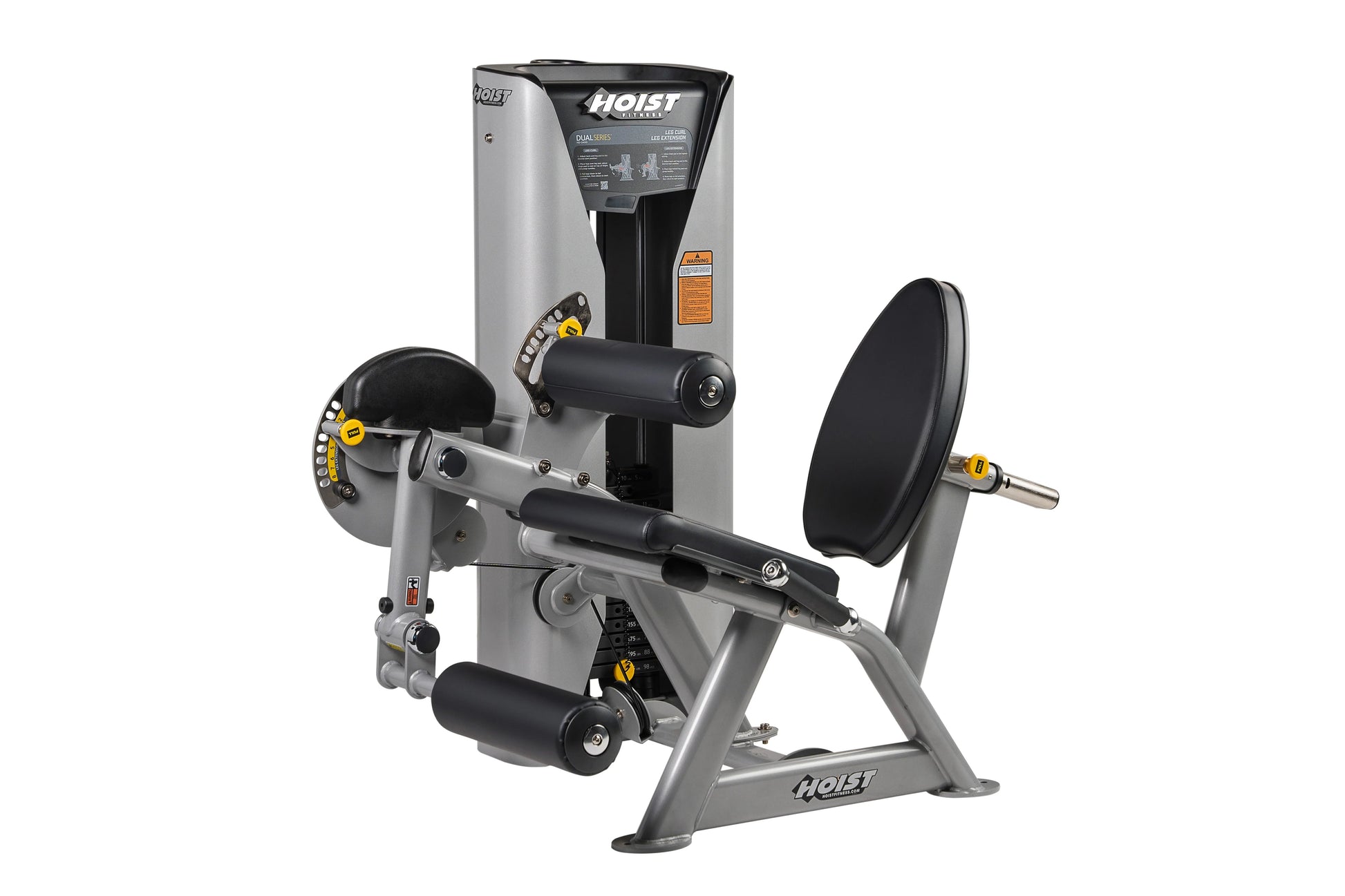 Hoist Dual Series silver and black leg extension and leg curl machine with yellow handles on white background