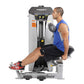 Hoist Dual Series ab crunch and low back exercise machine with man in blue tank top and black shorts performing seated ab cru