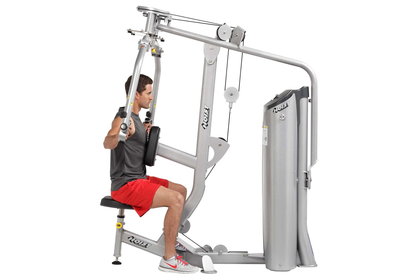 Man using silver Hoist Pec Fly/Rear Delt machine with cable system, demonstrated on white background