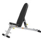 Hoist Folding Multi-Bench with black padded backrest and seat, silver metal frame, yellow safety labels, and black foot pads 