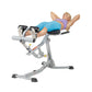 Woman using gray Hoist ab and back Roman hyperextension bench with adjustable leg extension, worn by model on white backgroun