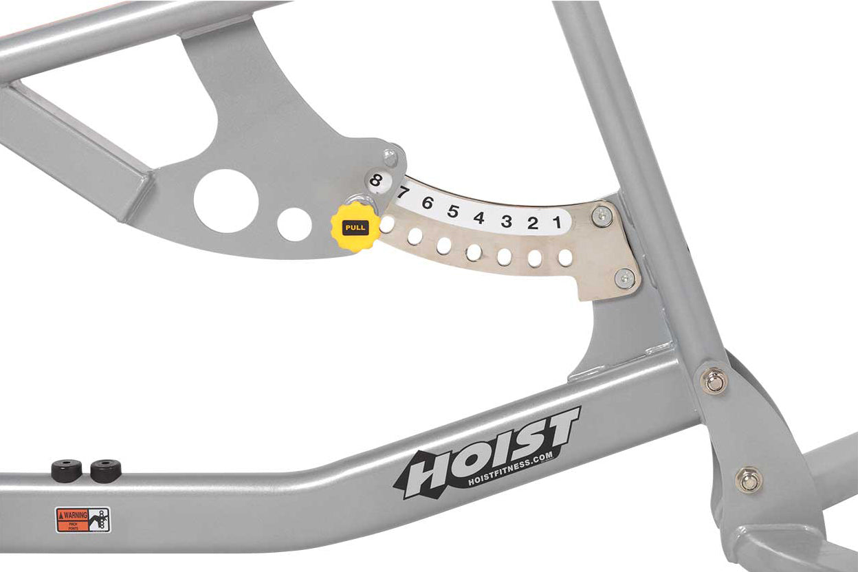 Gray Hoist weight bench frame with tan resistance adjustment plate numbered 1-8 and yellow pull indicator, metal construction