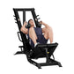 Black leg press and hack squat machine with male model demonstrating exercise position, adjustable footplate and handles on w