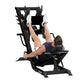 Black Hoist leg press and hack squat combo machine with user demonstrating exercise position on white background