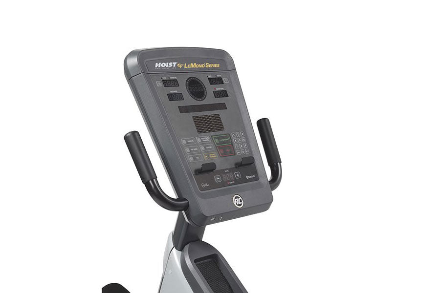 Hoist Lemond Series RC recumbent exercise bike with digital console, black handles, and gray frame on white background
