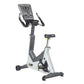 Hoist Lemond Series UC upright exercise bike with white frame, gray accents, digital console, and pedals on white background