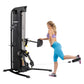 Hoist Mi5 Functional Trainer with black and silver frame, model in use demonstrating leg exercise