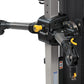 Hoist Mi5 Functional Trainer with black and yellow cable machine attachment mounted on steel frame, side view