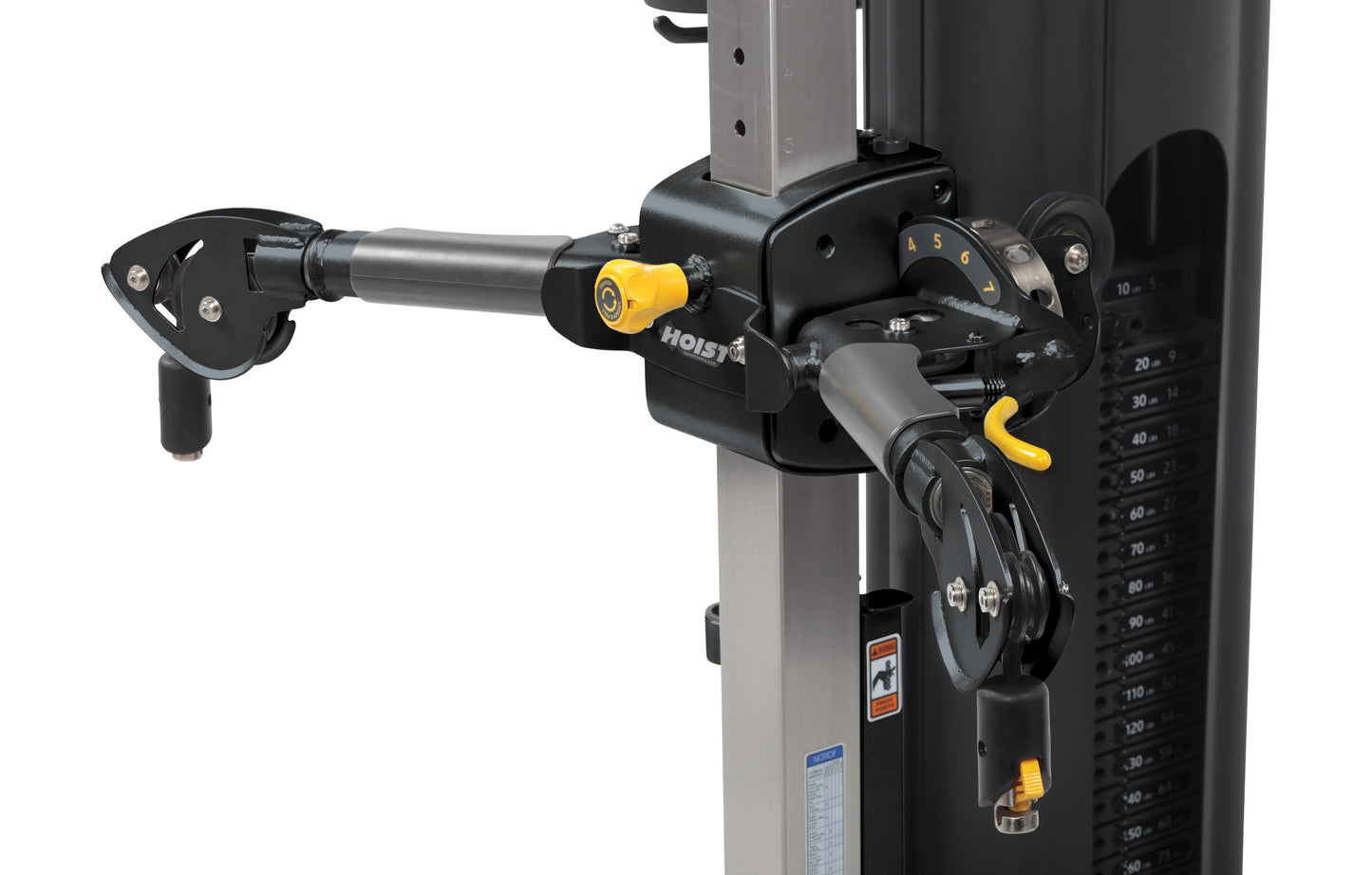 Hoist Mi5 Functional Trainer with black and yellow cable machine attachment mounted on steel frame, side view