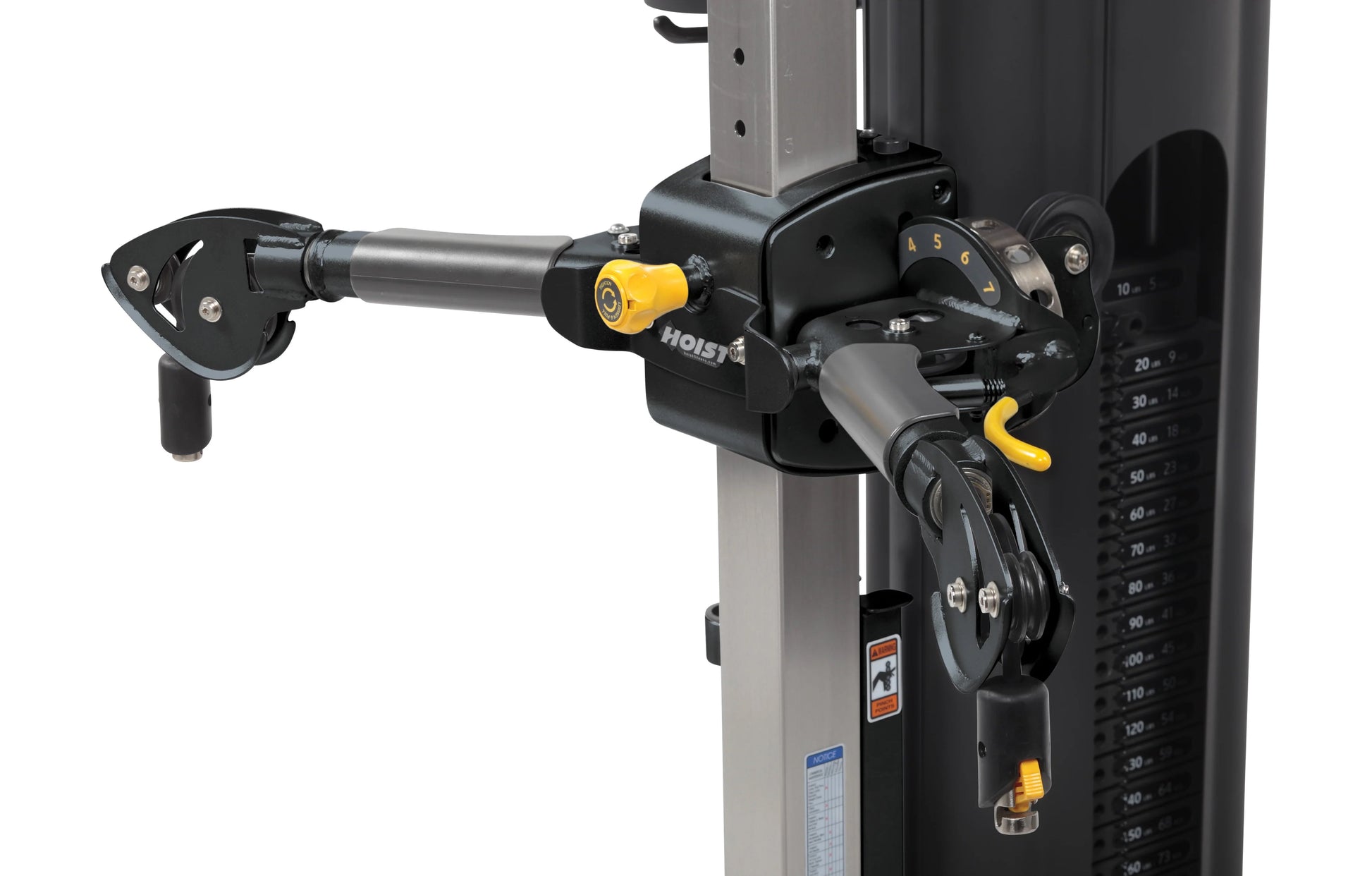 Hoist Mi5 Functional Trainer with black and yellow cable machine attachment mounted on steel frame, side view