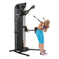Black and yellow Hoist Mi5 Functional Trainer with dual cable stations, shown with woman in blue capris and purple top perfor
