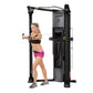 Hoist Mi6 functional trainer home gym with black frame and gray accents, shown in use by model on white background