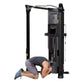 Hoist Mi6 black functional trainer home gym with model performing lat pulldown exercise on white background