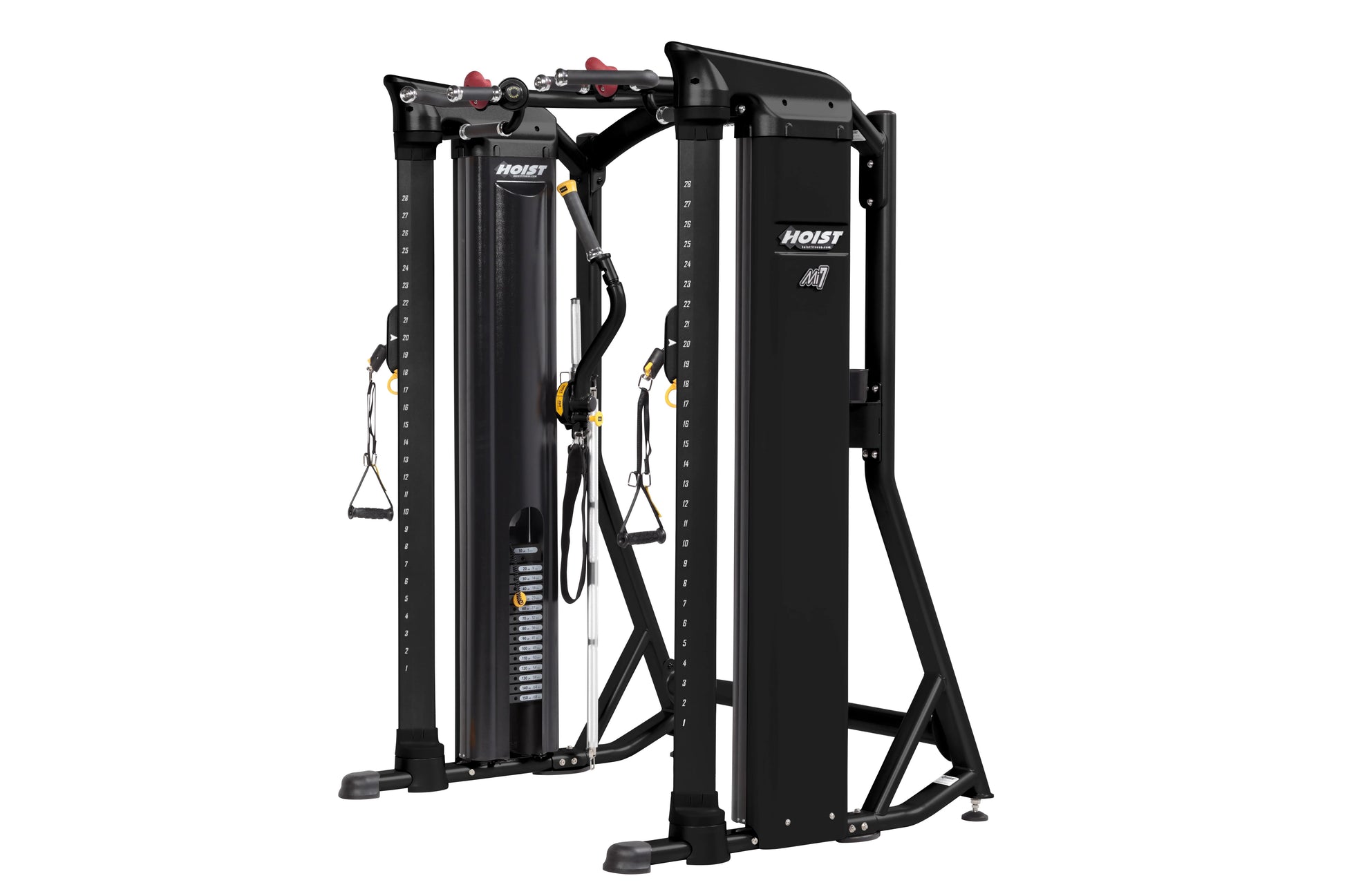 Hoist Mi7 black functional training system with dual weight stacks, cable attachments, and red adjustment handles on white ba
