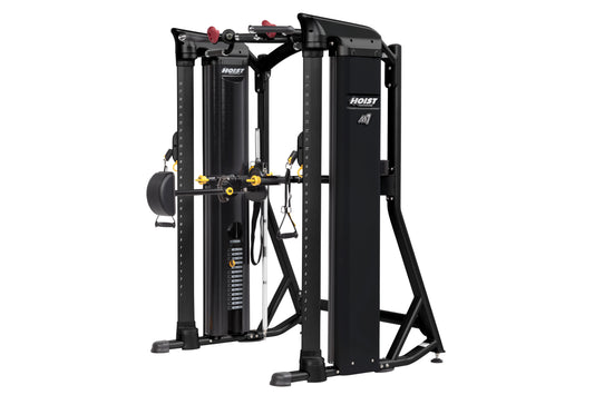Hoist Mi7 black functional training system with yellow accents and red adjustment handles, on white background