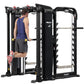 Man in blue tank top using black Hoist MI7 Smith functional trainer with red accents and yellow dumbbells, on white backgroun