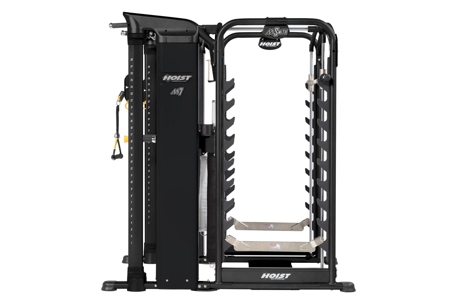 Black Hoist MI7 Smith machine with dual weight stacks, cable attachment arms, and foot platforms on white background