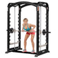Black Hoist Smith machine with dual chrome bars, shown with woman performing barbell exercise wearing teal sports bra and red