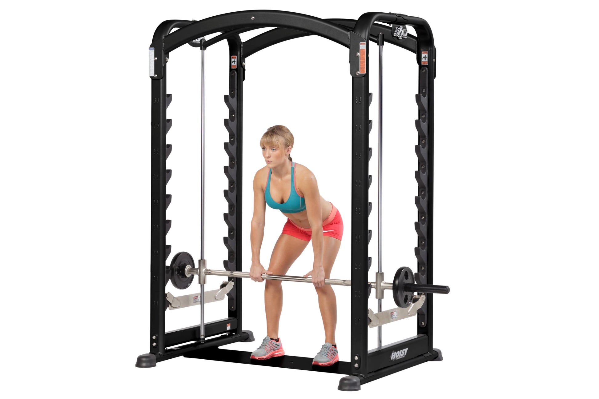 Black Hoist Smith Machine with dual cable system, model shown with woman demonstrating exercise form on white background
