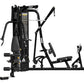 Black Hoist 2-Stack Multi Gym with weight stations, padded seats, and cable pulleys on white background