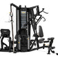 Hoist 4-Stack Multi Gym with black frame, cable pulley system, leg press, and weight stack selector on white background