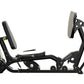 Black and gray recumbent leg press machine with adjustable foot pedals and backrest, shown in side view on white background