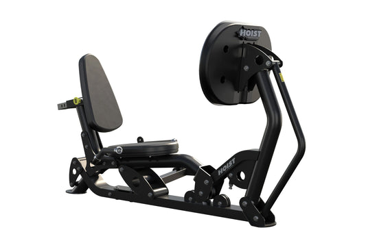 Hoist ROC-IT Ride Leg Press machine with black frame, gray padded seat and backrest, foot pedals, and circular resistance whe