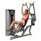 Hoist ROC-IT shoulder press machine with gray frame and black seat, demonstrated by woman in pink athletic wear on white back