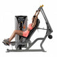 Hoist ROC-IT shoulder press machine with gray steel frame and black seat, woman in pink sports bra demonstrating upper body e