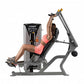 Woman using gray and black Hoist ROC-IT shoulder press machine with gold accents, demonstrated on white background