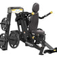 Hoist ROC-IT black seated dip machine with weight plates, padded seat back, and yellow grip handles on white background