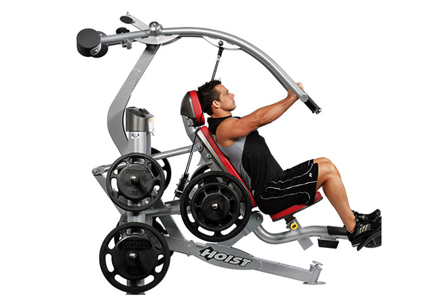 Hoist ROC-IT Lat Pulldown machine with silver frame, black weight plates, and red padded seat, demonstrated by male user in p