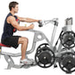 Man using silver and black Hoist ROC-IT seated mid row machine with weight plates, shown in side profile on white background