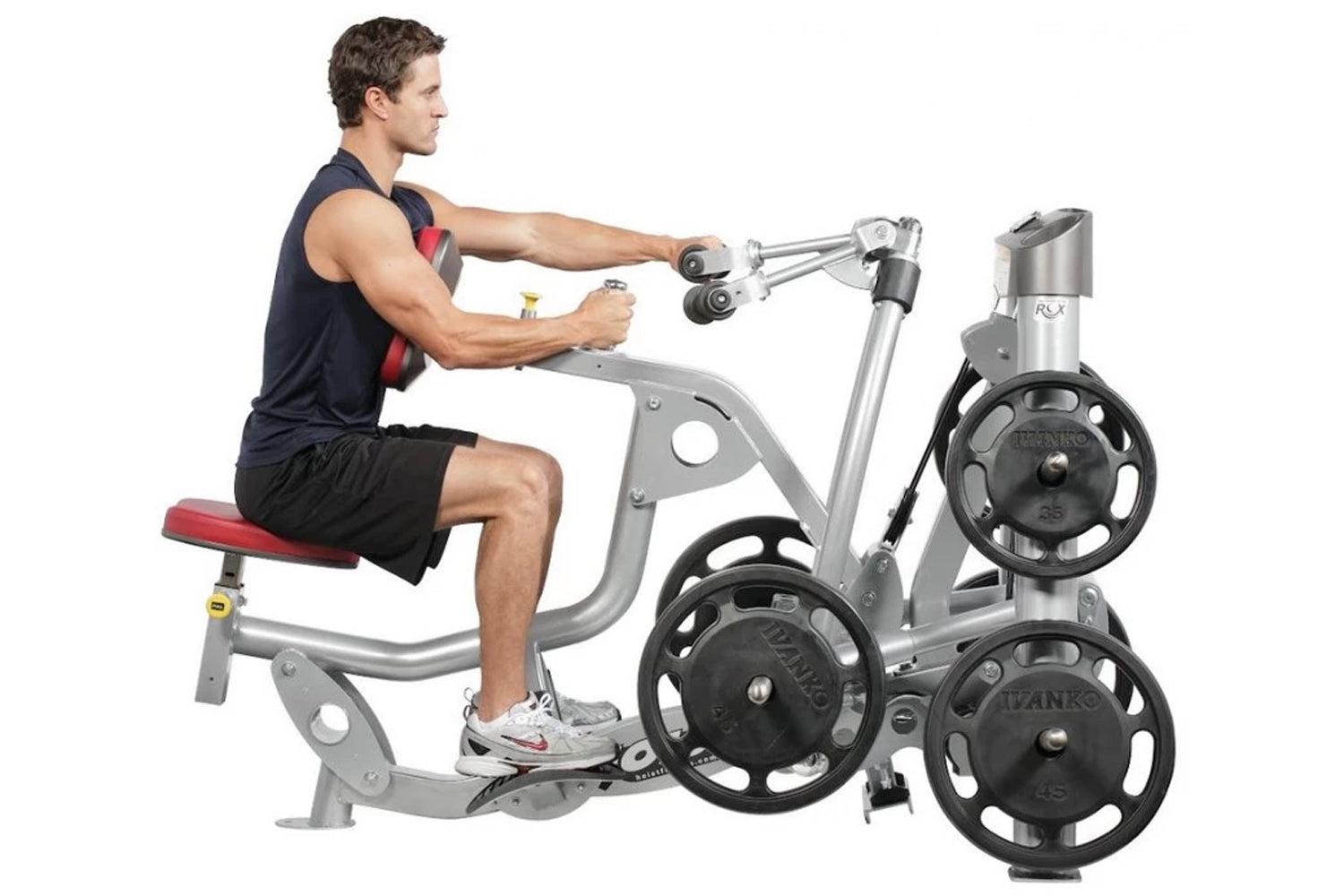 Man using silver and black Hoist ROC-IT seated mid row machine with weight plates, shown in side profile on white background
