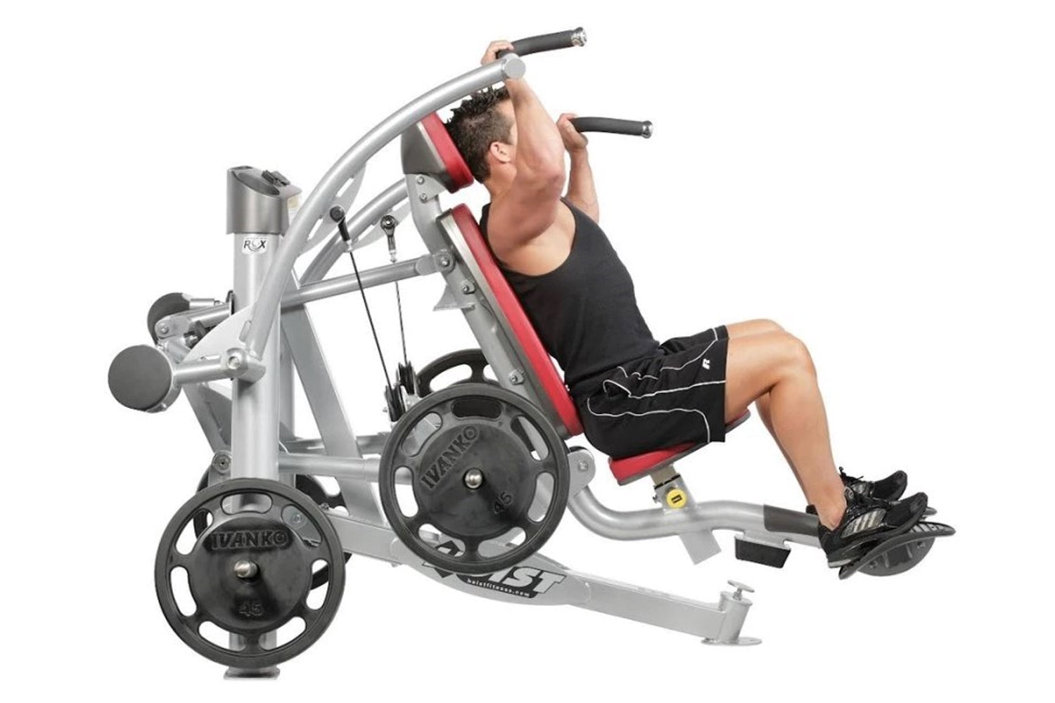 Hoist ROC-IT shoulder press machine with silver frame, red padding, and black weight plates, demonstrated by male user in bla