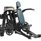 Hoist ROC-IT Shoulder Press Machine with black frame, blue padded seat and backrest, weight plates, and foot pedal on white b