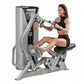 Hoist ROC-IT Seated Mid Row Machine in silver and black, demonstrated by woman in black tank top and shorts on white backgrou