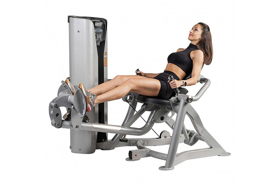 Hoist ROC-IT Lower Back Machine with gray metal frame and white tower, model RS-2204, demonstrated by woman in black athletic