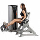 Woman using Hoist ROC-IT lower back machine with silver frame and black control panel, seated position on white background
