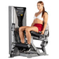 Woman using Hoist ROC-IT leg extension machine with silver and black frame, demonstrating seated leg exercise position