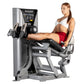 Woman using silver and black Hoist leg extension machine with adjustable footrest and control panel, on white background