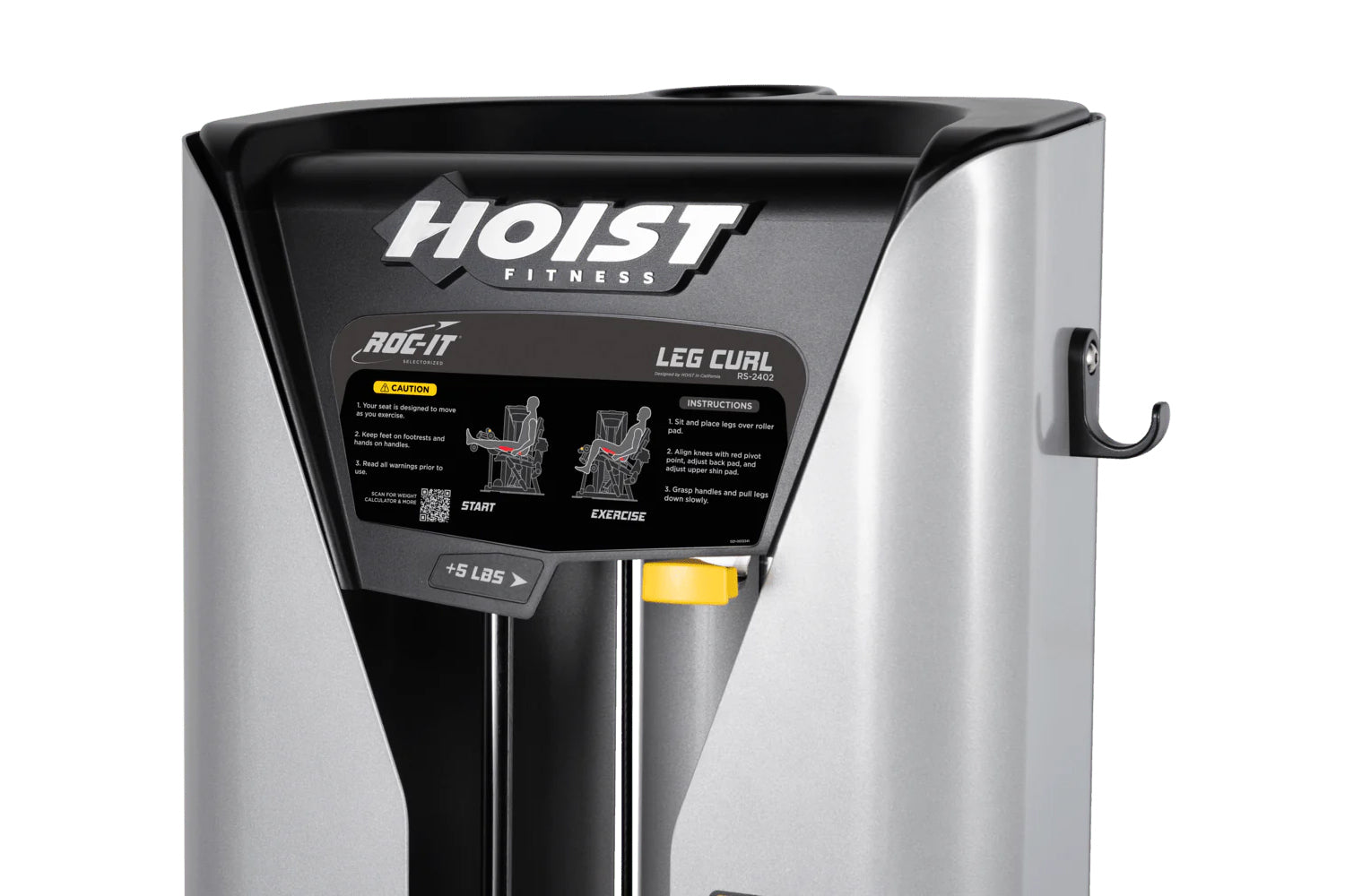 Hoist ROC-IT leg curl machine with black and silver frame, instruction panel, and yellow weight pin on white background