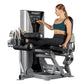 Woman in teal sports bra and black leggings using silver and black Hoist leg curl machine with digital display