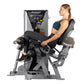 Woman using Hoist leg curl machine with silver and black frame, demonstrating leg exercise position on white background
