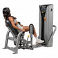 Woman using Hoist ROC-IT leg press machine with gray and black frame, digital control panel, and padded seat