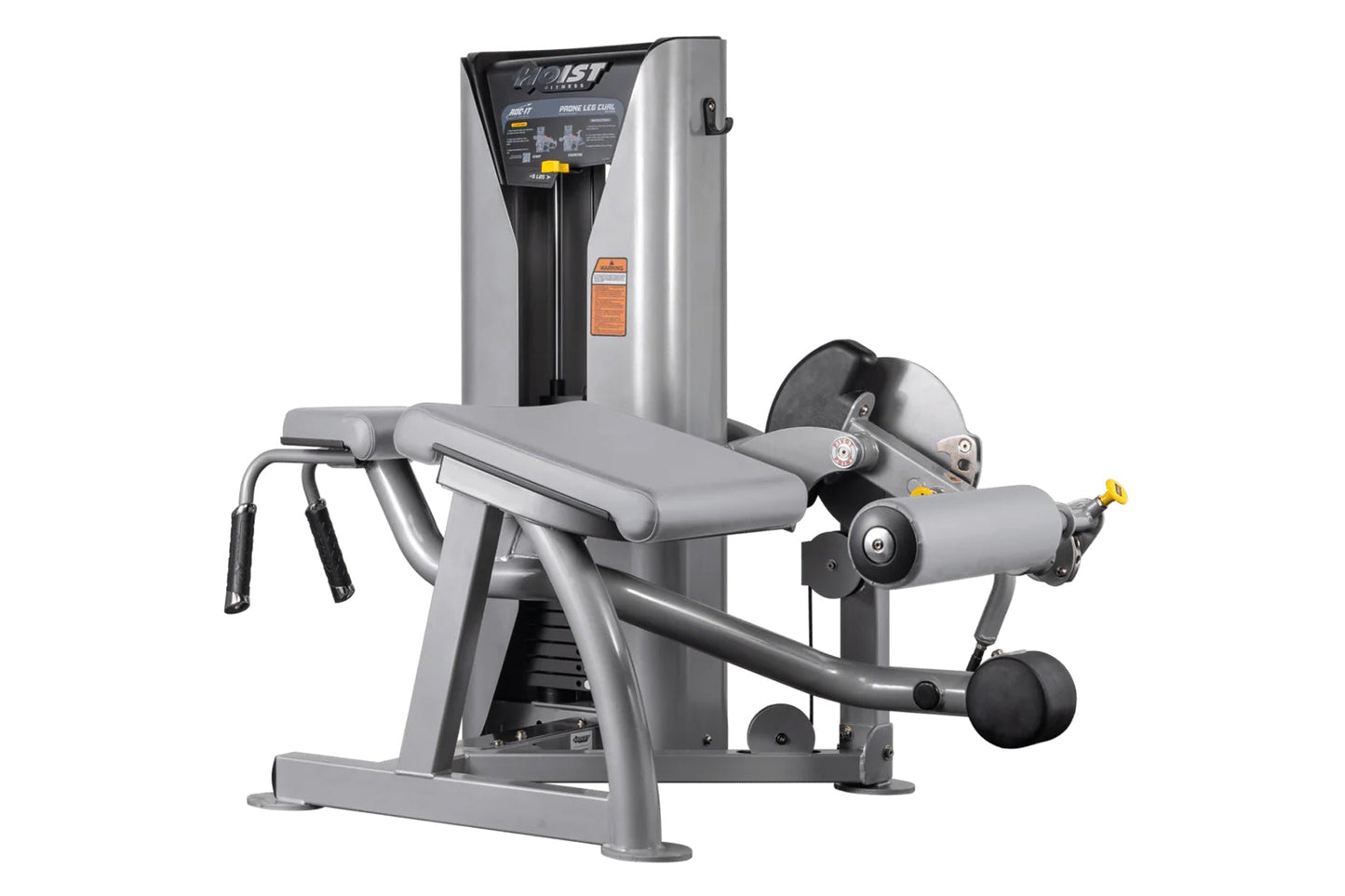 Hoist ROC-IT Prone Leg Curl Machine with silver frame, black padded seat and leg extension arm with weight stack on white bac