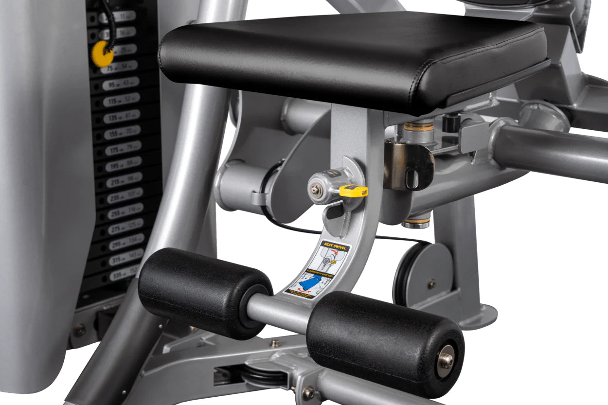 Hoist ROC-IT leg press machine with black padded seat, silver frame, and black foot pedals on white background