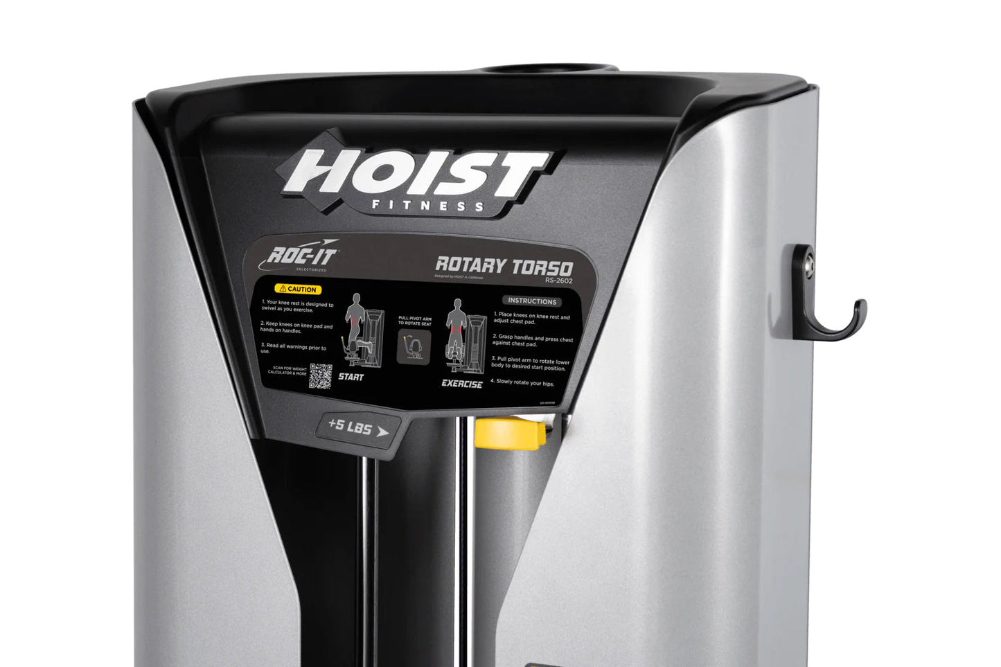 Hoist ROC-IT Rotary Torso machine with silver and black frame, instruction panel, and yellow weight selector on white backgro